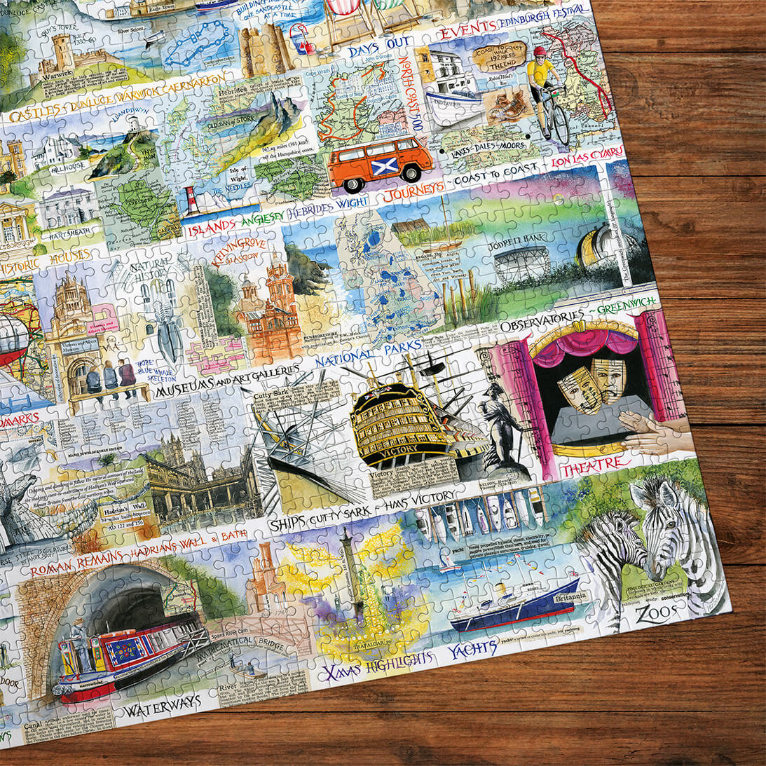 Gibsons Brilliant & British 1000 piece jigsaw puzzle for adults made up detail on wooden table