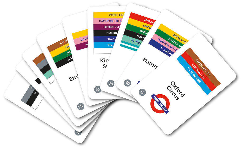 Set of playing cards with colorful design on a white background