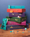 Stack of colorful Art File Classic games collection