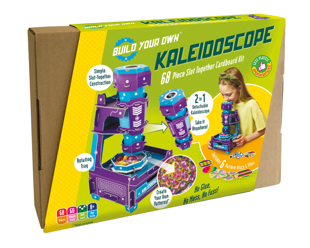Build Your Own Kaleidoscope 68-piece cardboard kit in its original retail box, featuring a bright yellow and lime green design with product illustrations and a photo of a child using the toy.