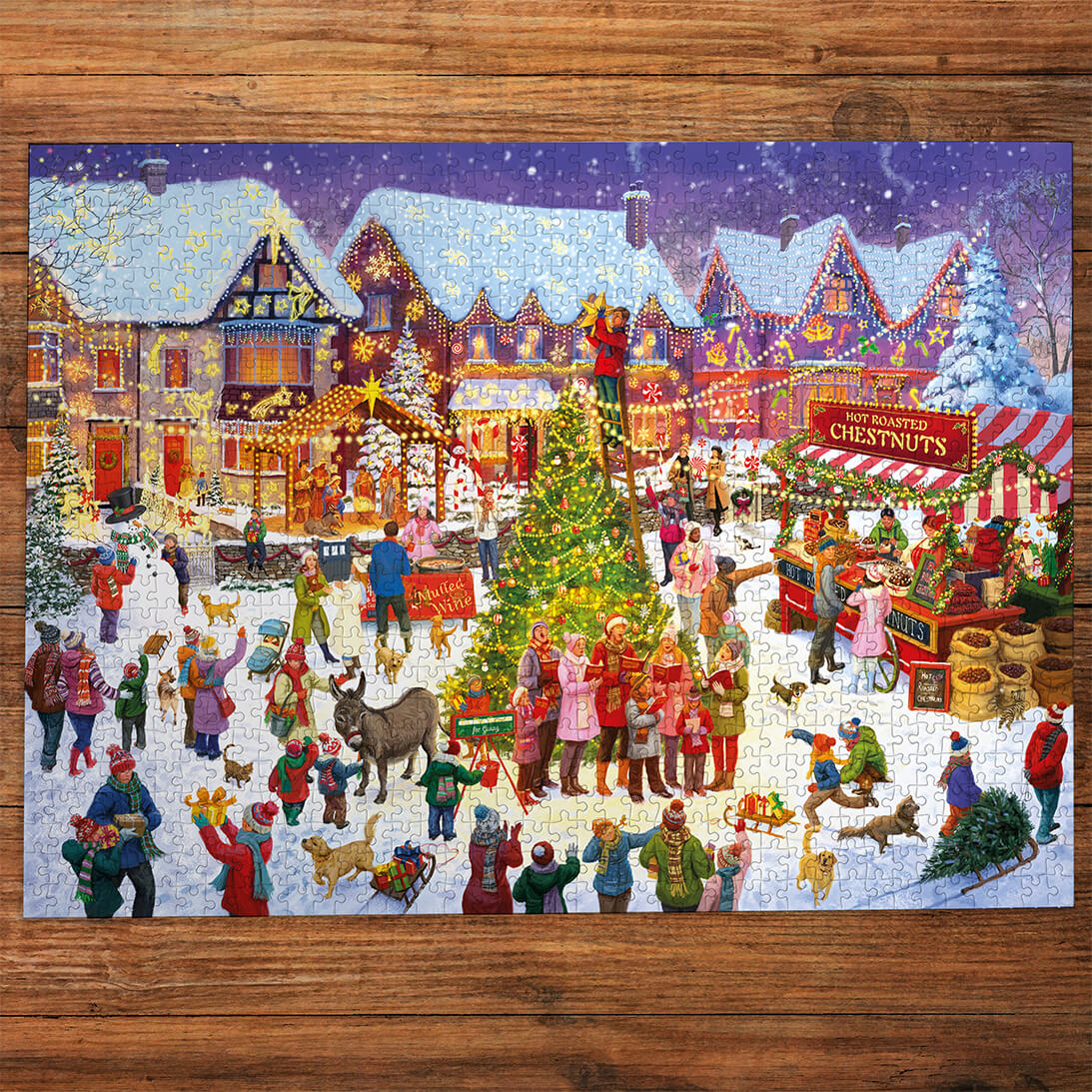 Gibsons The Season for Giving 1000 piece jigsaw puzzle for adults made up on wooden table