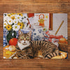 A Cracking Bake 100XXL puzzle in blue Gibsons made up on wooden table
