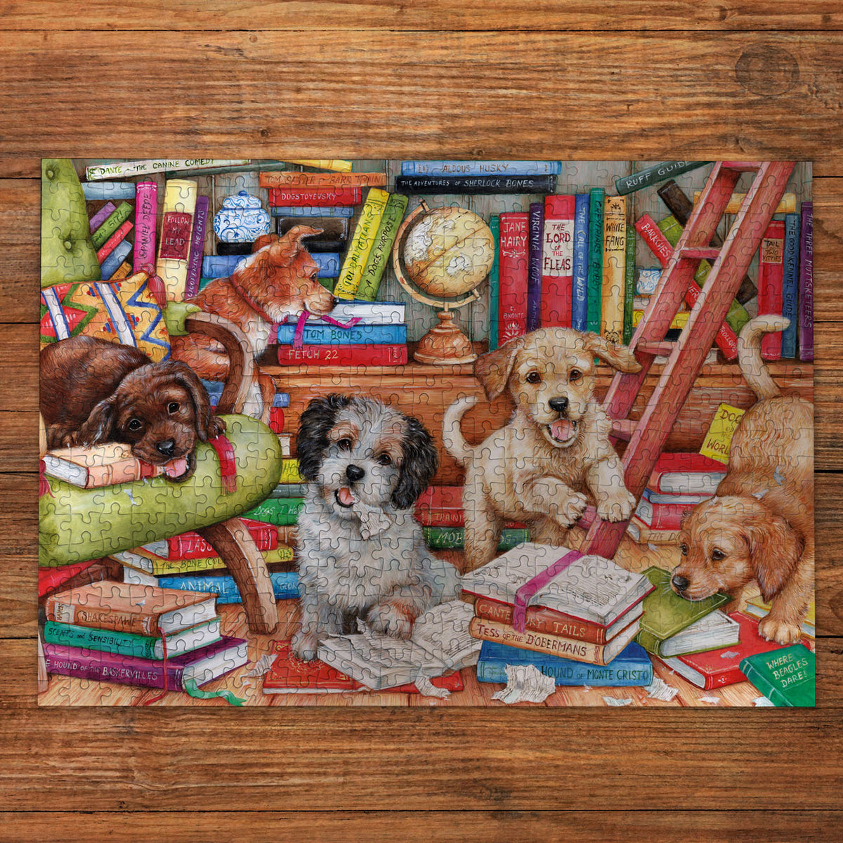 Jigsaw puzzle with dogs around books and a globe on a wooden surface