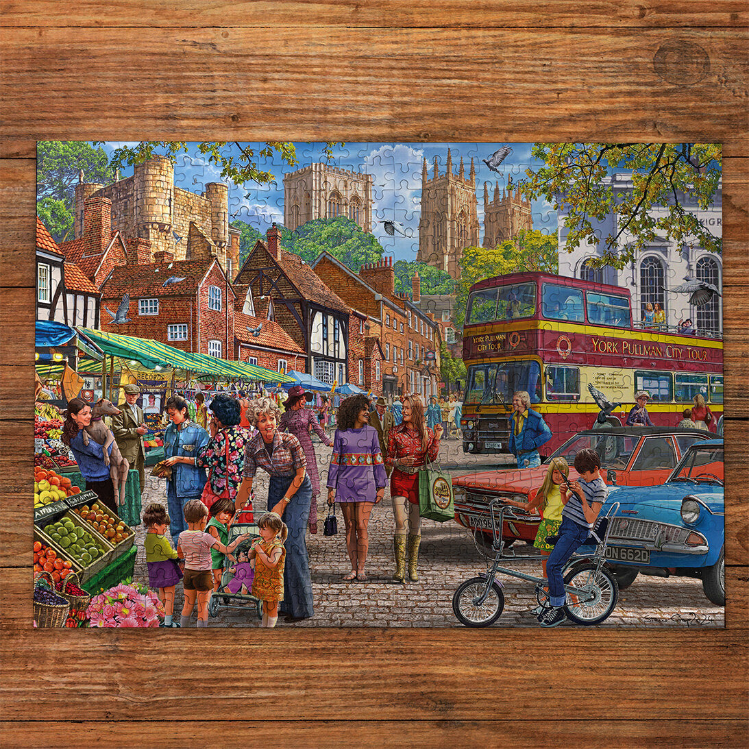 Gibsons York Market 250 extra large piece jigsaw puzzle made up on wooden table