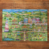Celebrating Summer 500 Piece Jigsaw Puzzle by Gibsons made up on wooden table