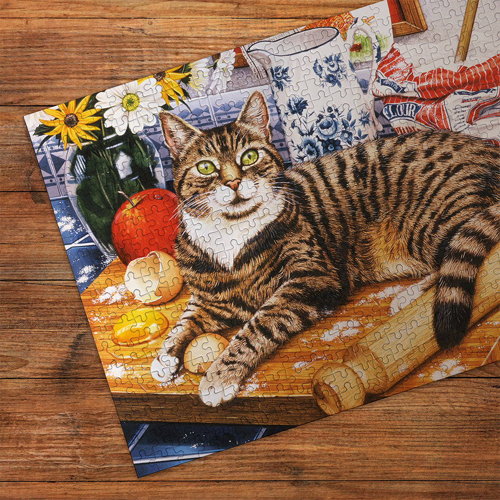 Gibsons A Cracking Bake 500 Piece Jigsaw Puzzle for Adults made up on wooden table