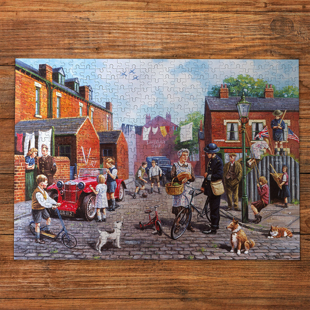 Britain at War 500 Piece Jigsaw Puzzle made up on wooden table
