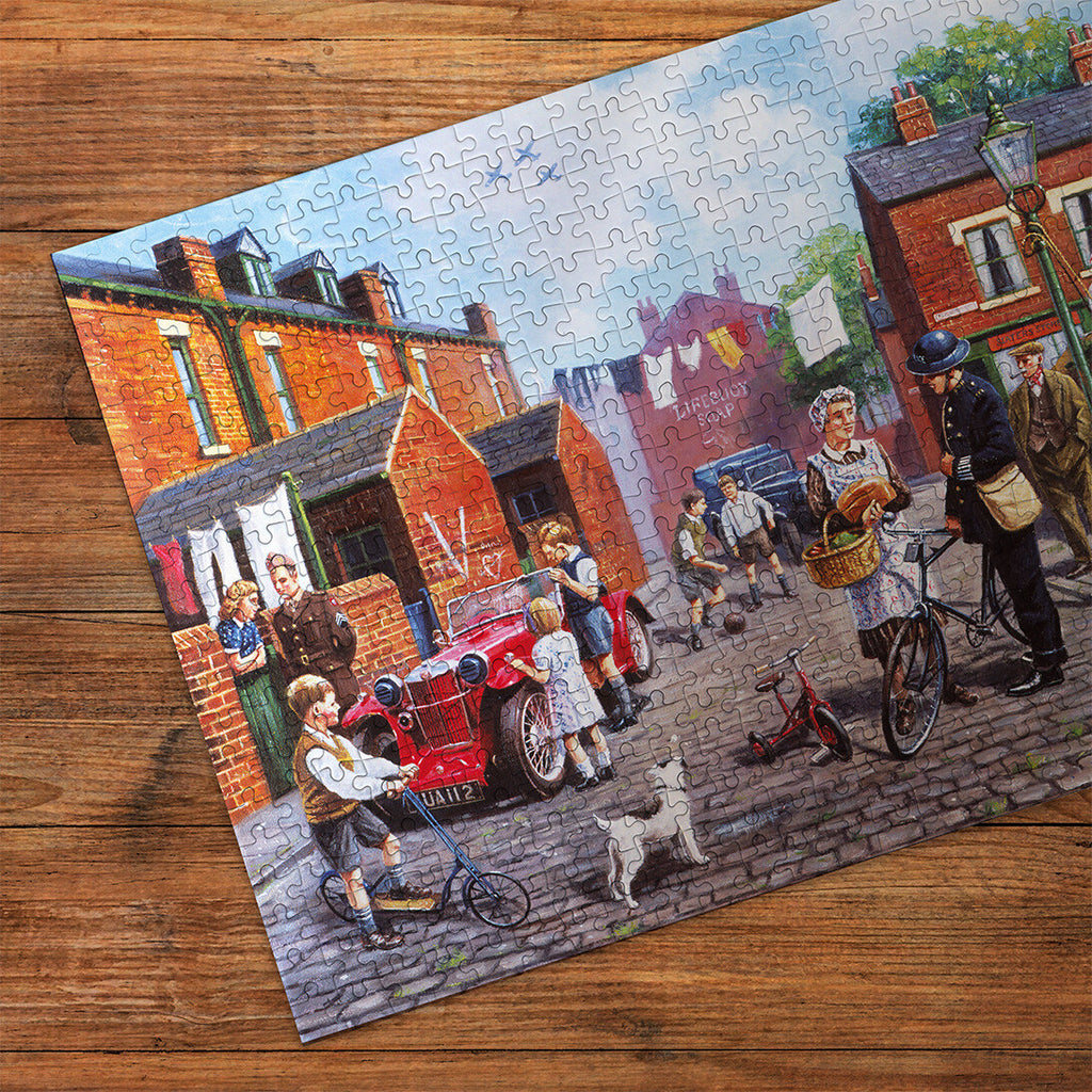 Britain at War 500 Piece Jigsaw Puzzle made up detail on wooden table
