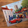 Gibsons Touring the Town 500 Piece Traditional Nostalgic Jigsaw Puzzle for Adults made up detail on wooden table