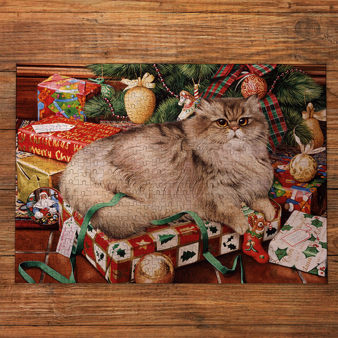 Gibsons All Wrapped Up 500 Jigsaw Puzzle for Adults made up on wooden table