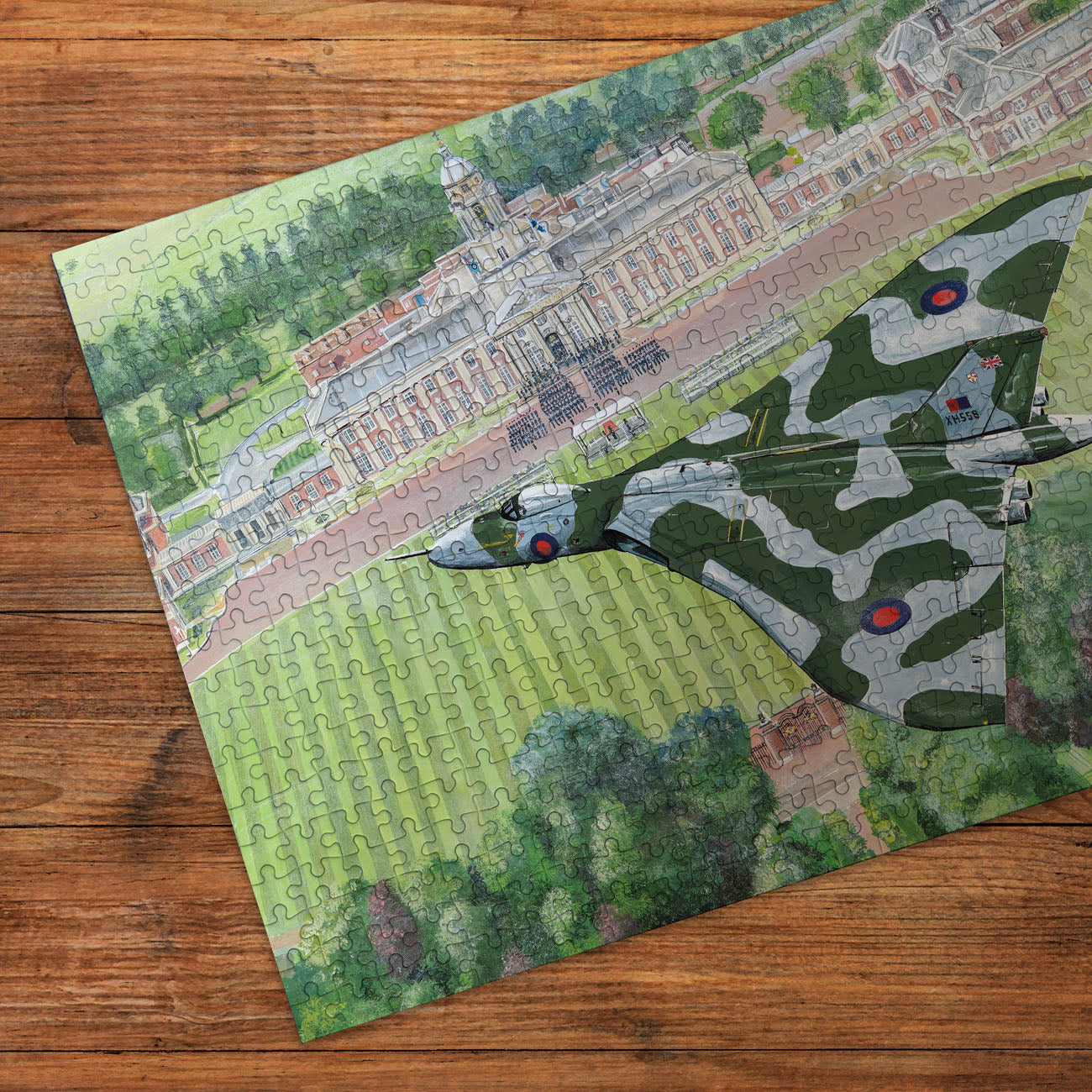 Jigsaw puzzle with an airplane design on a wooden surface