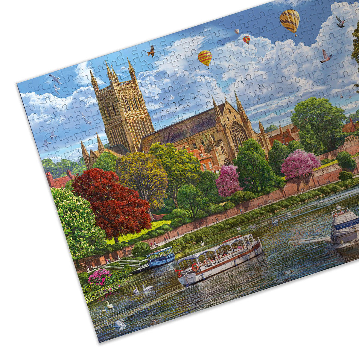 Jigsaw puzzle with a scenic view of a cathedral by a river, colorful balloons in the sky, and boats on the water.