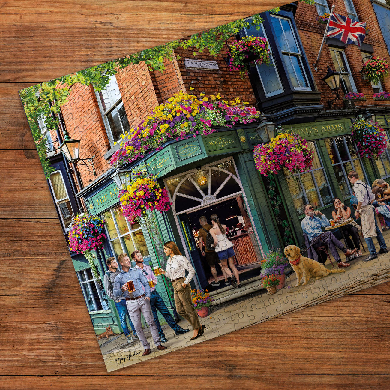 Jigsaw puzzle with a pub scene on a wooden surface