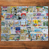 Gibsons Bright Lights & Big Cities Extra Large 500 Piece Jigsaw Puzzle made up on wooden table