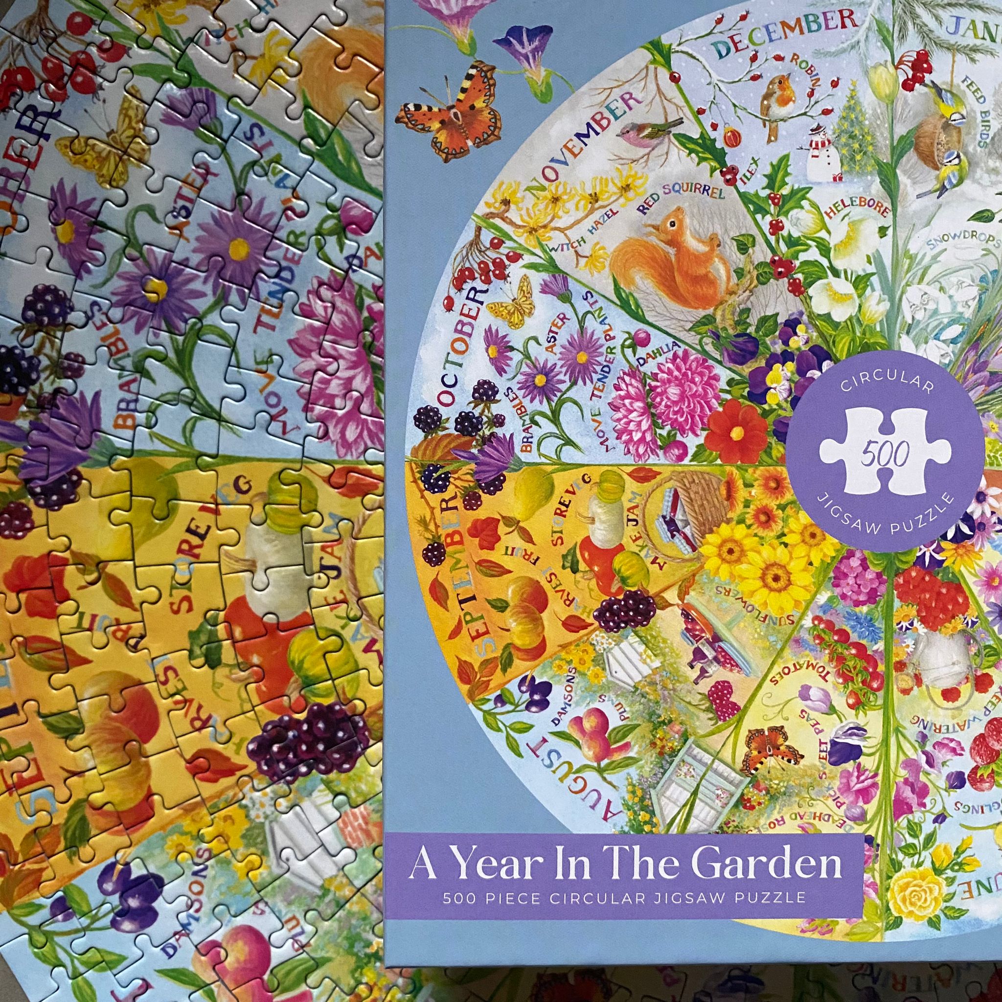 Circular jigsaw puzzle with a garden-themed design on a blue background