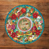 Gibsons Seasons Greetings 500 Circular Christmas Jigsaw Puzzle made up on wooden table