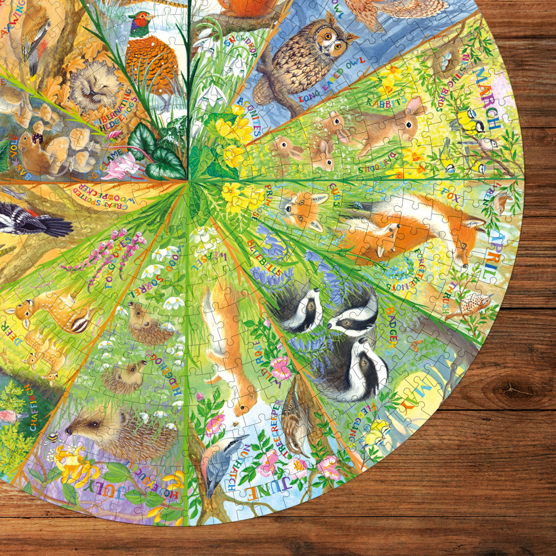Round puzzle with animal illustrations on a wooden surface