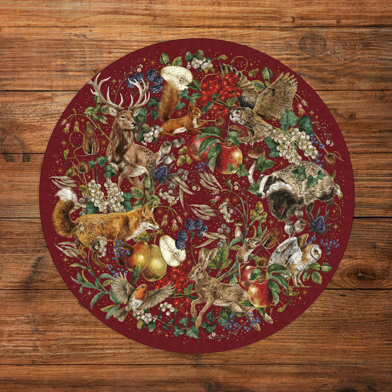 Decorative round puzzle with nature-themed design on a wooden surface