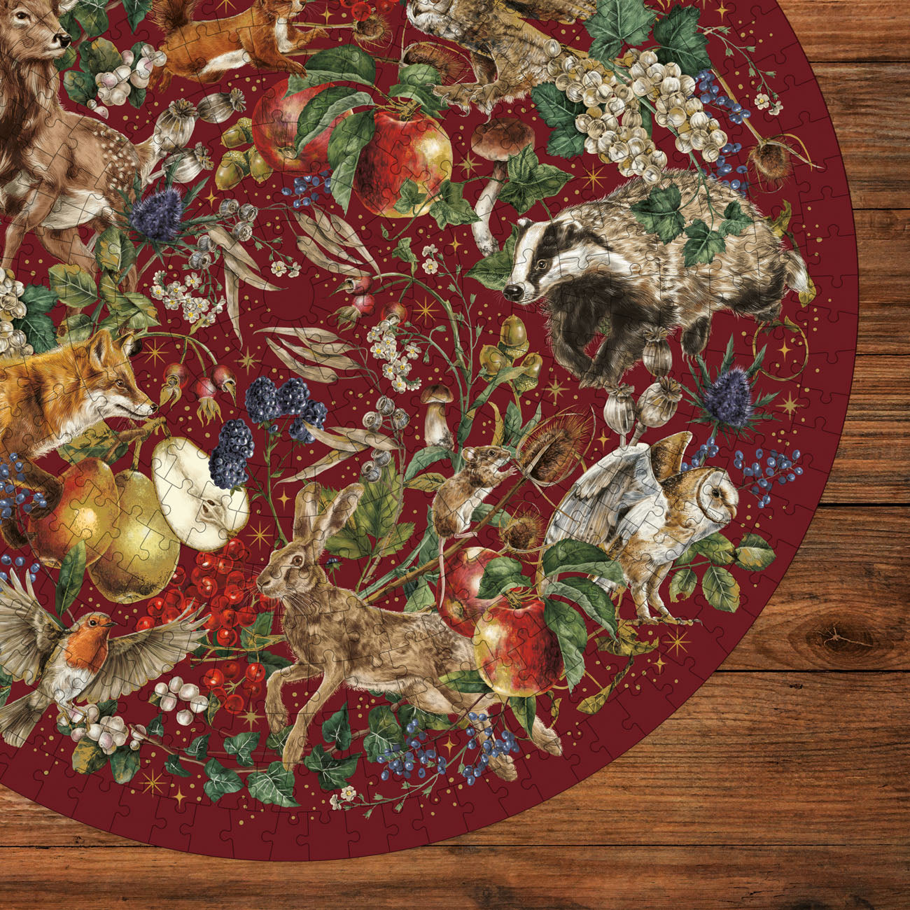Round puzzle with nature-themed design featuring animals and plants on a wooden surface.