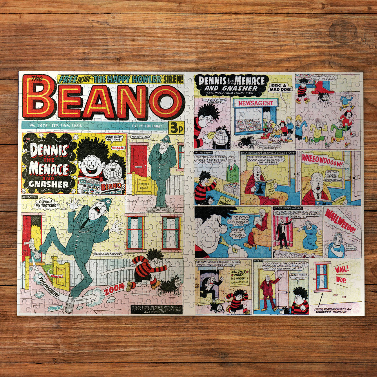 Comic book cover of 'The Beano' featuring Dennis the Menace and Gnasher on a wooden surface.