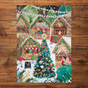 Gibsons Christmas in London 3x500 Gift Multi-box Christmas Market magic made up on wooden table