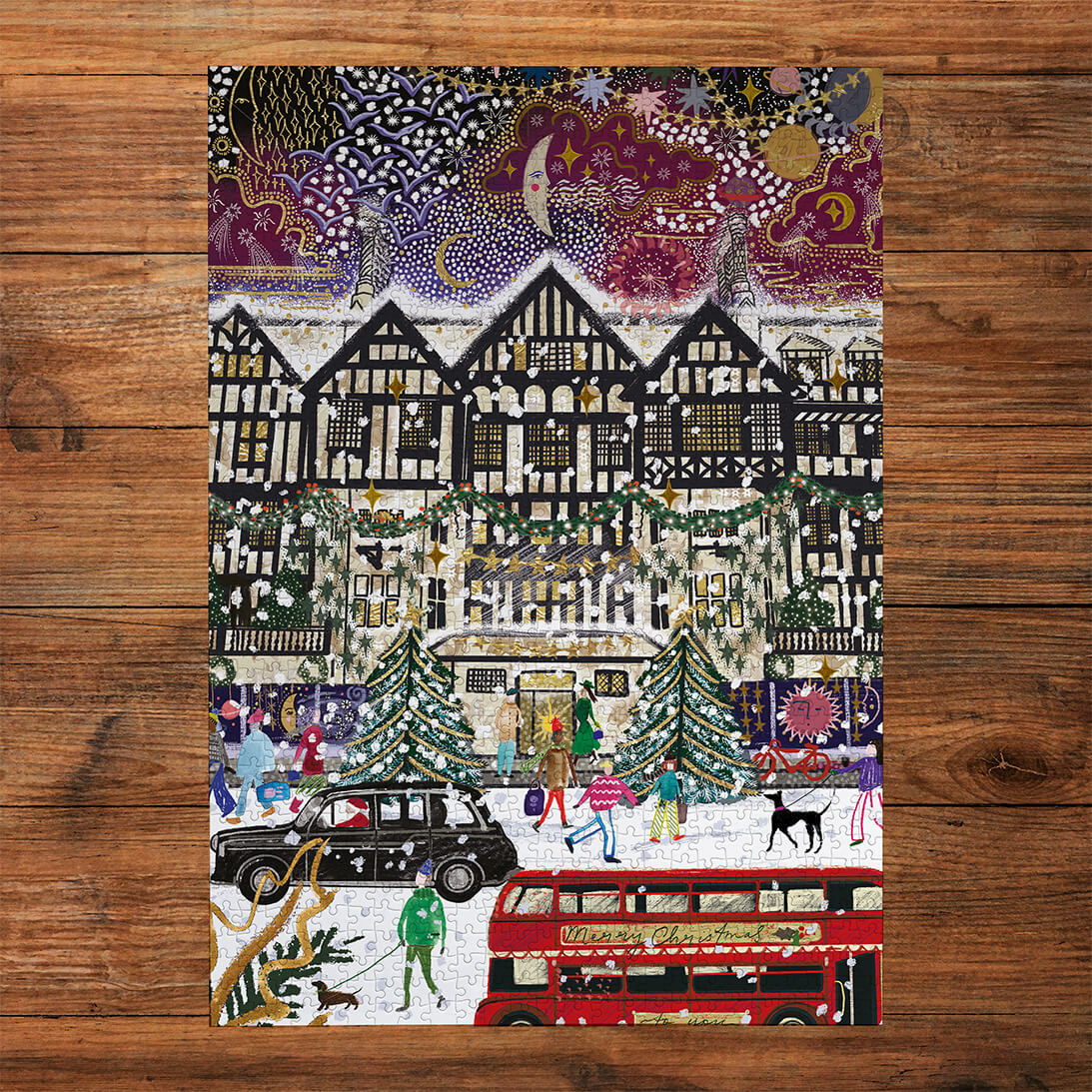 Gibsons Christmas in London 3x500 Gift Multi-box Shoppers in the Snow made up on wooden table