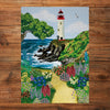 Gibsons Call of the Coast 3x500 Multi-box Gift Set Jigsaw Puzzles, the Morning Tides made up on wooden table