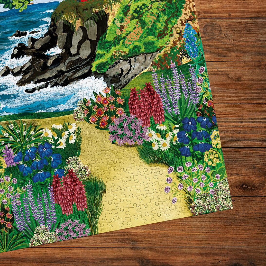 Gibsons Call of the Coast 3x500 Multi-box Gift Set Jigsaw Puzzles, the Morning Tides made up detail on wooden table