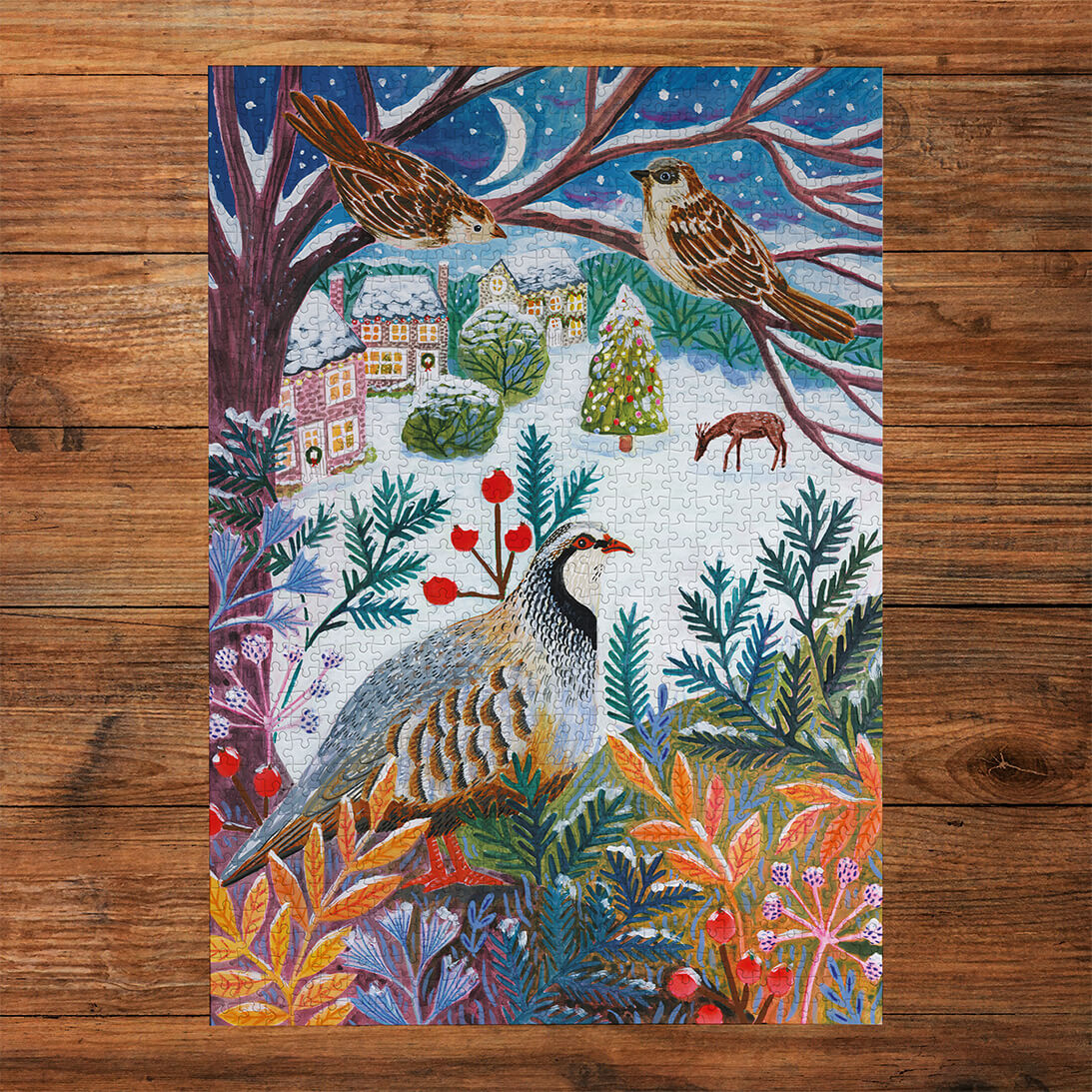Gibsons Frosty Fauna 3x500 Gift Set Perfect Jigsaw Puzzles made up on wooden table