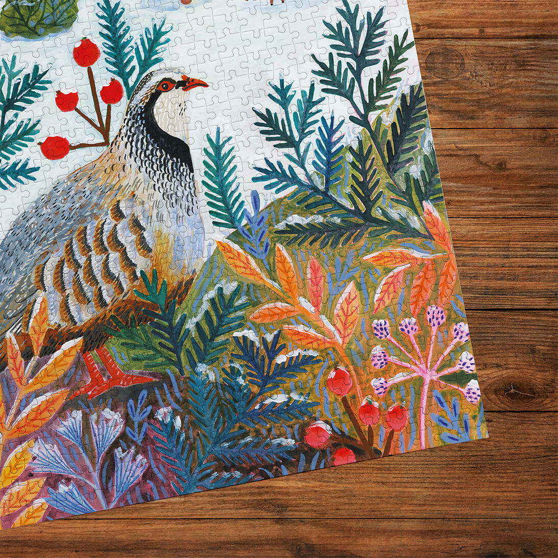 Gibsons Frosty Fauna 3x500 Gift Set Perfect Jigsaw Puzzles made up on wooden table