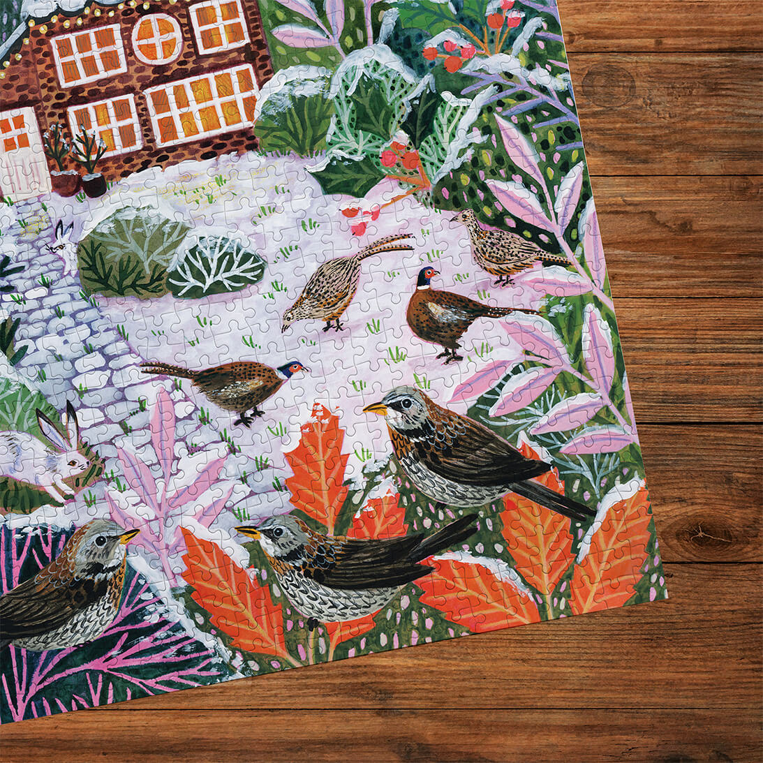 Gibsons Frosty Fauna 3x500 Gift Set Perfect Jigsaw Puzzles made up on wooden table