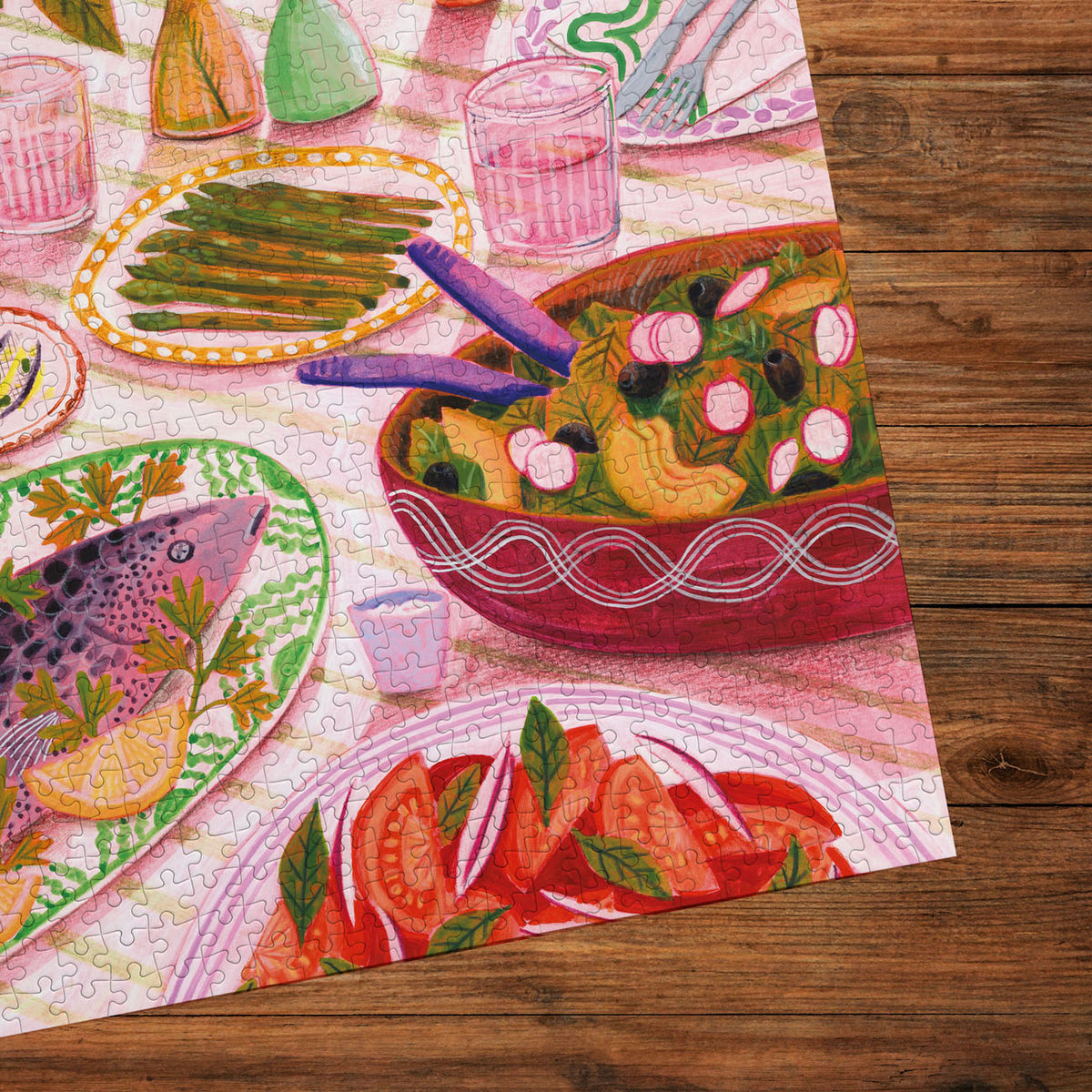 Colourful jigsaw puzzle with table setting with food items on a wooden surface