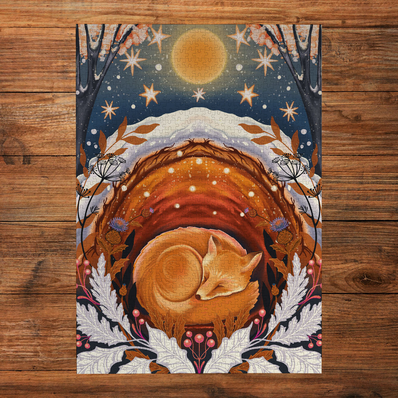 Illustration of a fox in a winter landscape with stars and snow on a wooden surface