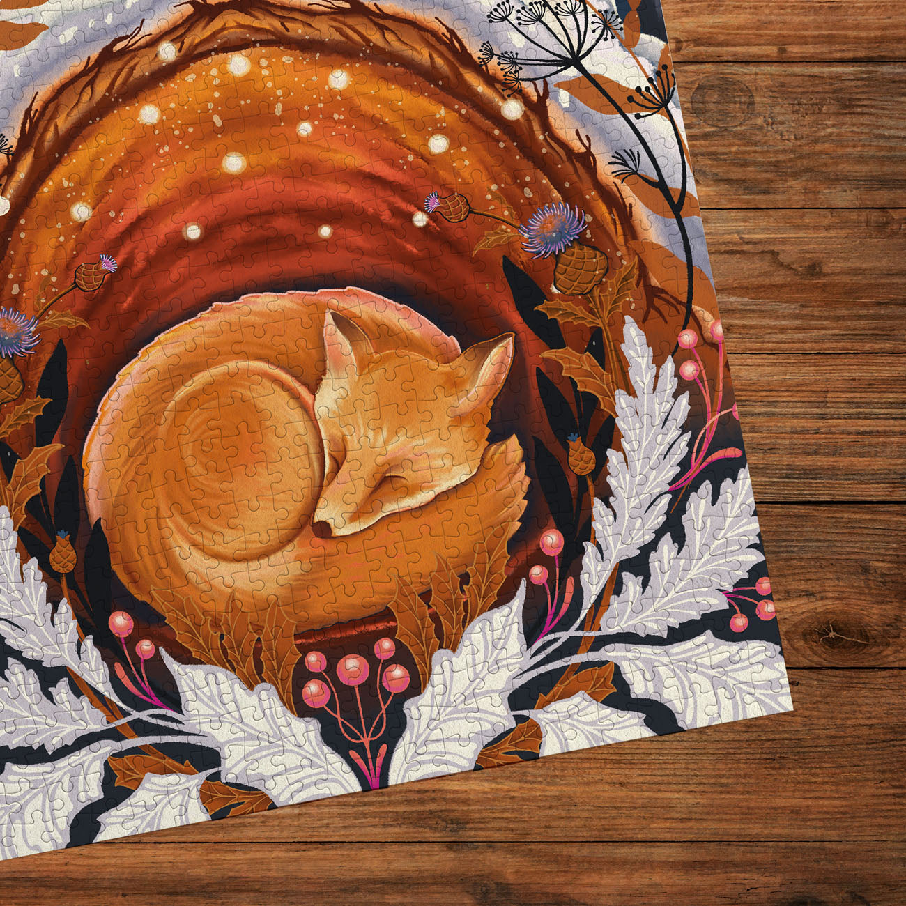 Jigsaw puzzle with a fox design on a wooden surface