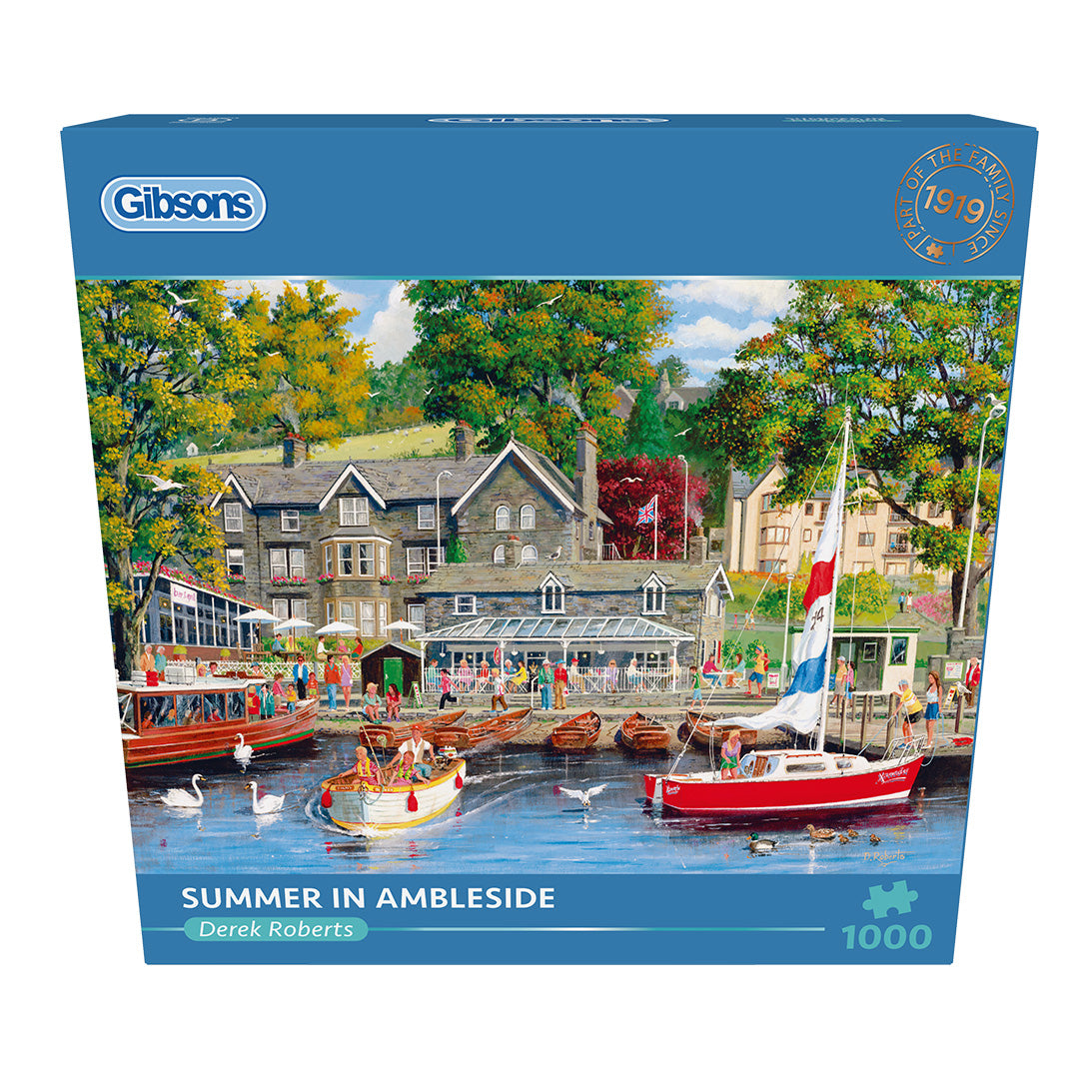 Gibsons puzzle box featuring a scenic view of a town with boats and people on a dock.