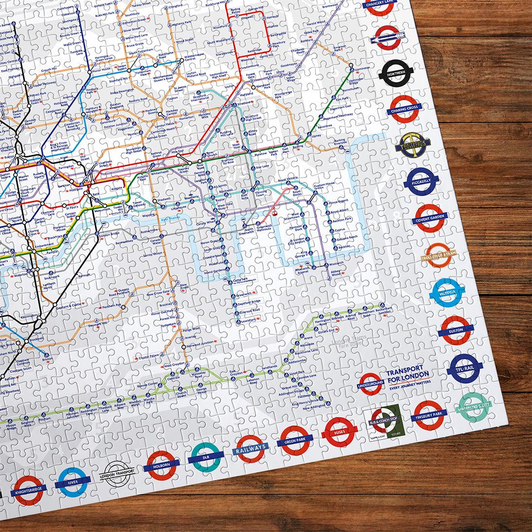 London underground map made up jigsaw puzzle on a wooden surface detail corner
