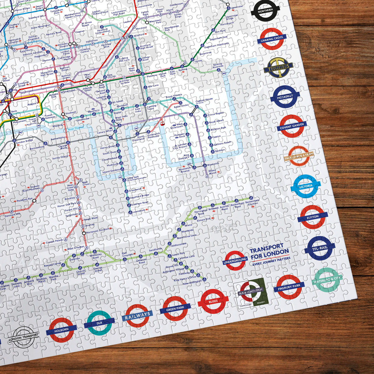 London underground map made up jigsaw puzzle on a wooden surface