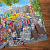 Colorful market scene with people and stalls on a wooden surface