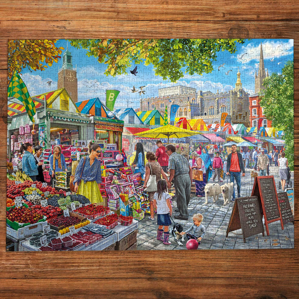 Colorful outdoor market scene with people and stalls on a wooden surface