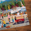 Detail of Jigsaw puzzle with an ice cream cart scene on a wooden table