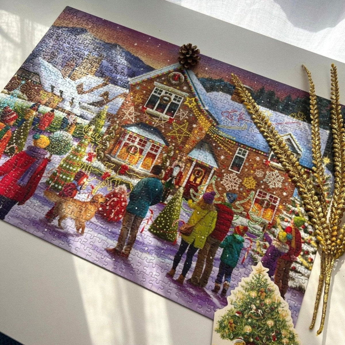 Gibsons Dressed Up for Christmas  1000 Piece Jigsaw  puzzle on table with Christmas decoration