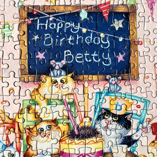 Floating Puzzle Piece Revealing A Glowing Happy Birthday Message Surrounded Other Pieces Creating Magical Celebratory Image359147526