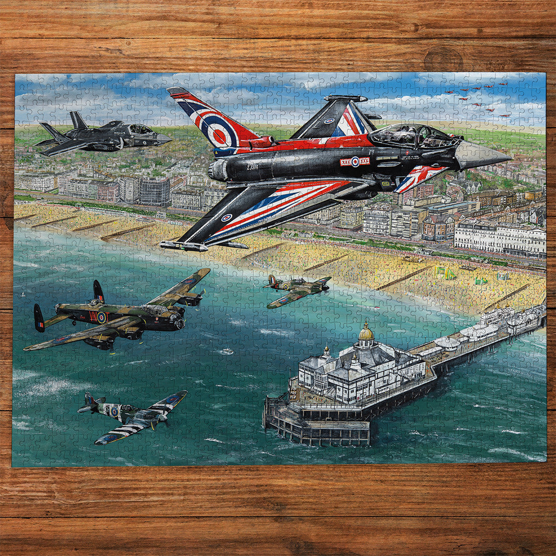 Gibsons Airshow Over Eastbourne 1000 Piece jigsaw puzzle made up on wooden table