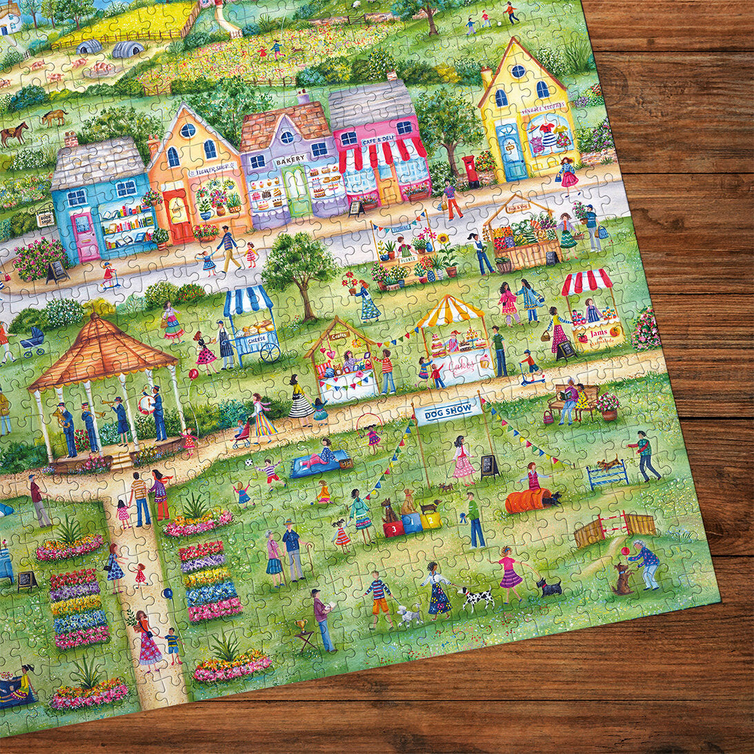 Gibsons Celebrating Summer 1000 Piece Jigsaw Puzzle made up detail on wooden table