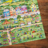 Gibsons Celebrating Summer 1000 Piece Jigsaw Puzzle made up detail on wooden table