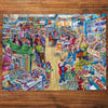 Gibsons Crafter's Paradise 1000 Piece Jigsaw Puzzle made up on wooden table