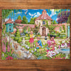The Dovecote 1000 Piece Jigsaw Puzzle by Gibsons made up on wooden table