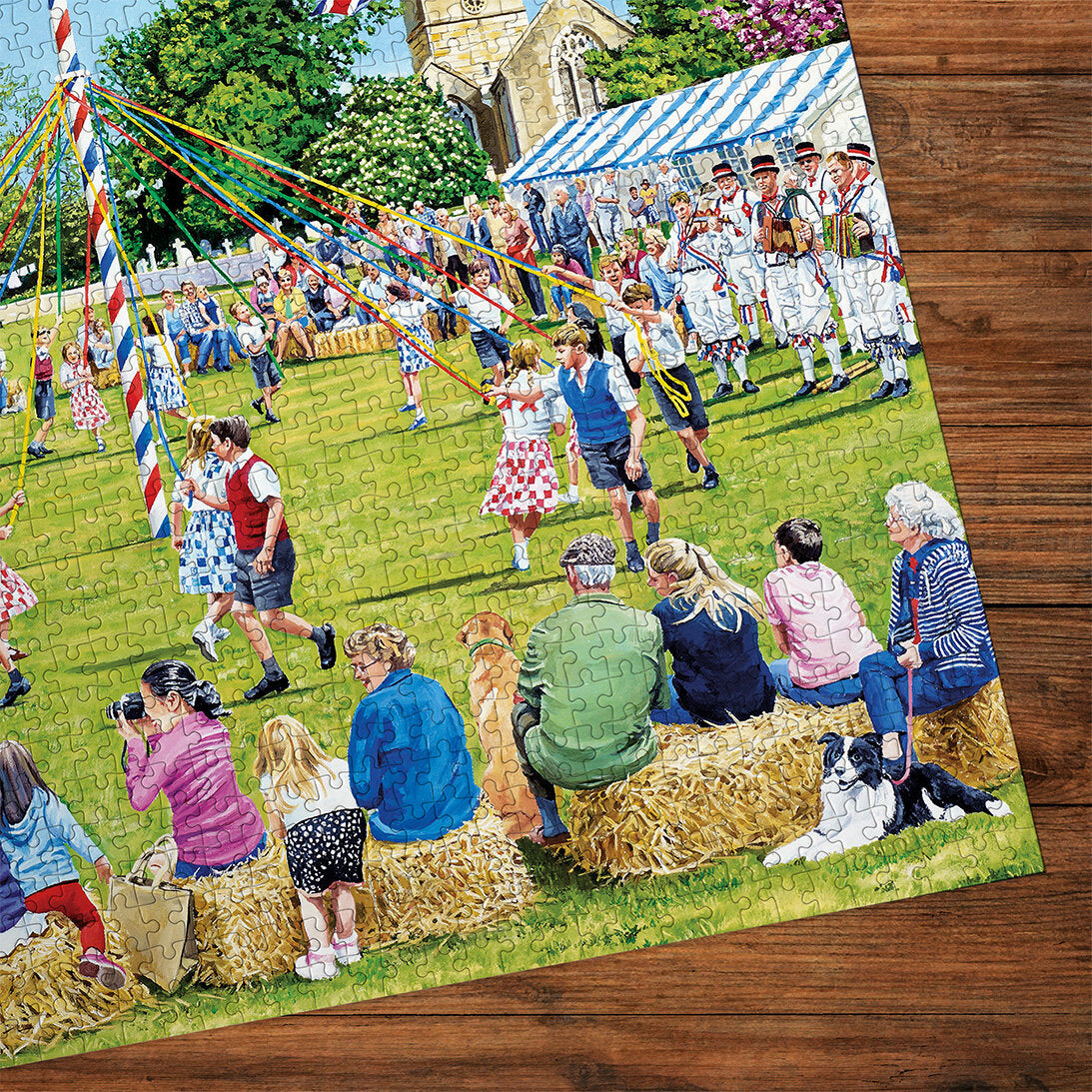 Gibsons Around the Maypole 1000 Piece Jigsaw puzzle made up detail on wooden table