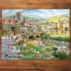 Ducks & Paddling 1000 Piece Jigsaw Puzzle by Gibsons made up on wooden table
