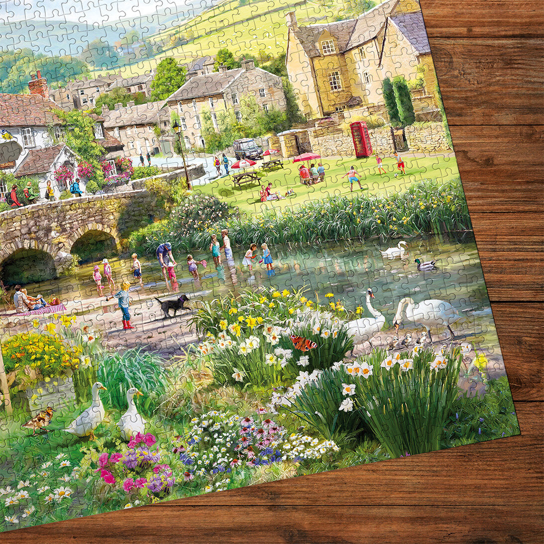 Puddle Ducks & Paddling 1000 Piece Jigsaw Puzzle by Gibsons made up detail on wooden table